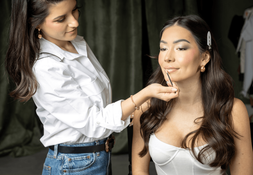 Behind the scenes: professional hair and makeup styling before a branding photo session