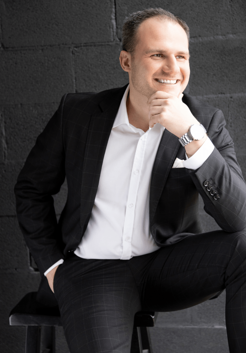 Professional headshot of a businessman in a suit, photographed in Barrington IL